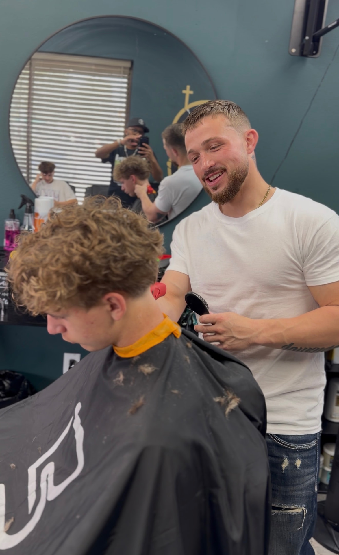 Barber Eddie "Sloman Stylez" at Crown Cuts