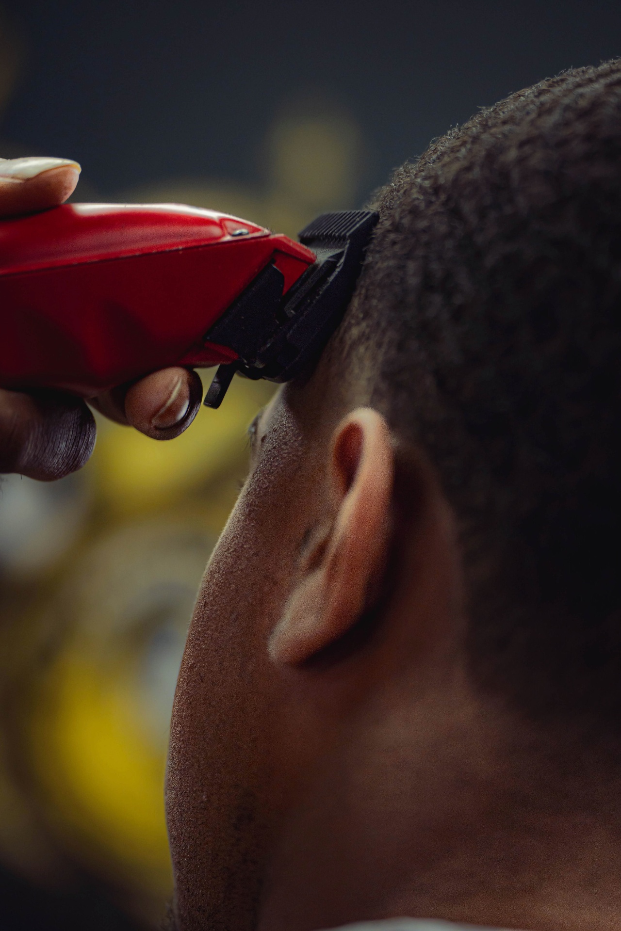 Red clippers shaping a clean line