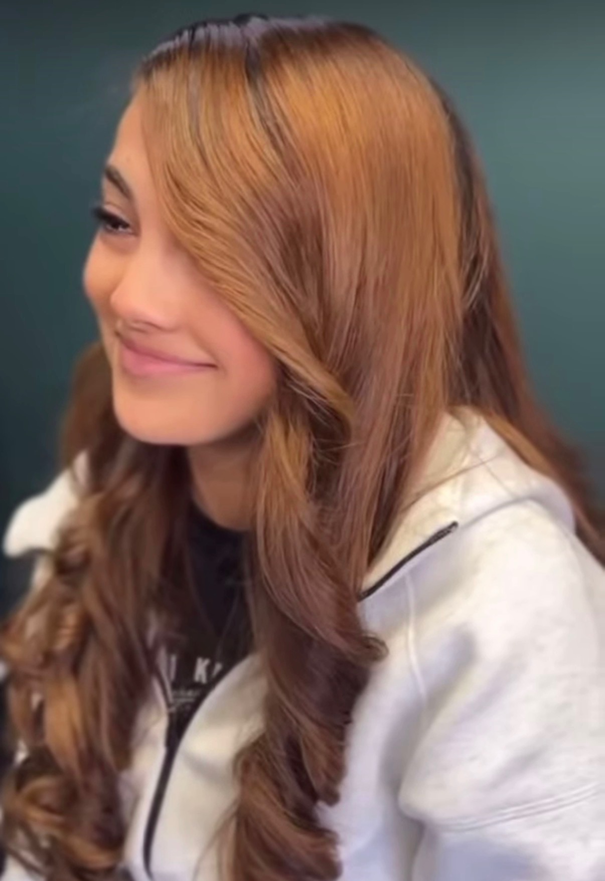 Copper balayage with long layered waves
